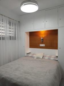 Krevet ili kreveti u jedinici u okviru objekta Ático Playa Cullera