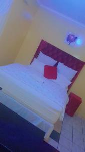 Postel nebo postele na pokoji v ubytování Creg Guest House Rustenburg