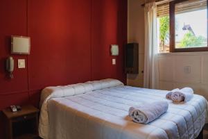 Ένα ή περισσότερα κρεβάτια σε δωμάτιο στο Hotel Roma +19 φωτογραφίες