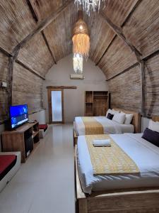 Grand Daghan Cottage 객실 침대