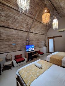 Grand Daghan Cottage 객실 침대