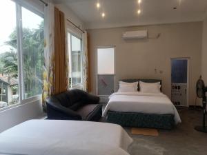 Postel nebo postele na pokoji v ubytování Summer villa Ambagolla