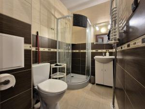 Koupelna v ubytování Sztorm Hel - mieszkanie blisko centrum + 1 fotografie