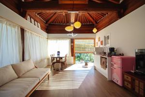 a living room with a couch and a table at Jahayeon Hanokstay in Jeonju