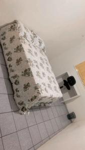 a pillow sitting on the floor in a room at Hostel Teresina in Teresina
