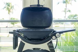 a grill sitting on the back of a scooter at El Tigre, Green Bay I Shared Pool in Nuevo Vallarta 