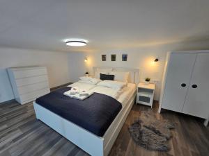 Posteľ alebo postele v izbe v ubytovaní Maria Apartments - Modern apartments in the center of Budapest
