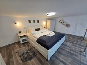 Posteľ alebo postele v izbe v ubytovaní Maria Apartments - Modern apartments in the center of Budapest