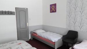 Postel nebo postele na pokoji v ubytování Statek Polánka