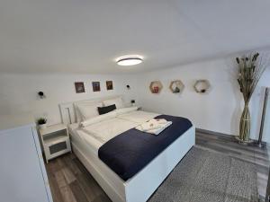 Posteľ alebo postele v izbe v ubytovaní Maria Apartments - Modern apartments in the center of Budapest