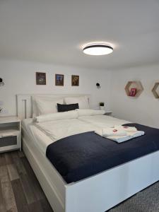 Posteľ alebo postele v izbe v ubytovaní Maria Apartments - Modern apartments in the center of Budapest