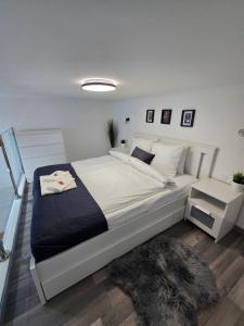 Posteľ alebo postele v izbe v ubytovaní Maria Apartments - Modern apartments in the center of Budapest