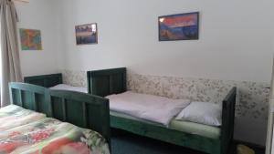 Postel nebo postele na pokoji v ubytování Statek Polánka
