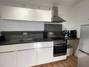 Η κουζίνα ή μικρή κουζίνα στο Ferienwohnung Buttenheim