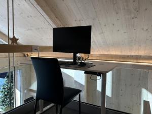 TV o dispositivi per l'intrattenimento presso Tiny Sera mit privatem Whirlpool