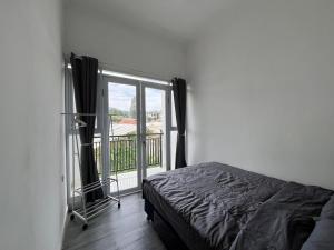 Ένα ή περισσότερα κρεβάτια σε δωμάτιο στο Two Bed Rooms House at Parongpong Near Lembang