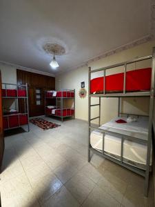 Postel nebo postele na pokoji v ubytování Riad dar Malak