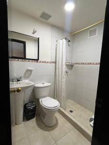 Koupelna v ubytování Greco Boutique Hotel + 2 fotografie