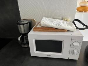 Kuchyň nebo kuchyňský kout v ubytování Appart -Rés du Parc-Hardelot-plage