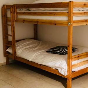 a bunk bed in a room with a bunk bed frame at Villa Sonnenpiste in Kötschach