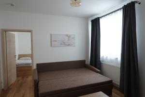 Postel nebo postele na pokoji v ubytování Apartmán Rozárka Černý Důl