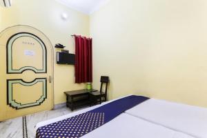 Balajee Residency客房内的一张或多张床位