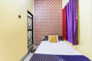 Balajee Residency客房内的一张或多张床位