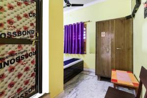 Balajee Residency客房内的一张或多张床位