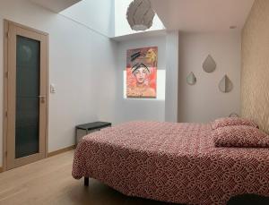 Postel nebo postele na pokoji v ubytování Loft avec Vue