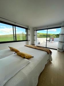 Postel nebo postele na pokoji v ubytování Loft avec Vue