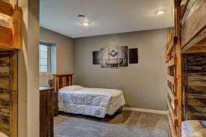 a bedroom with two beds in a room at Eagles Haven in Eagle River