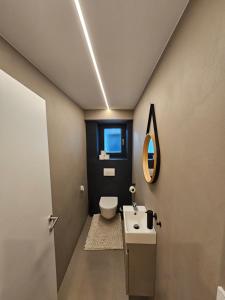 Kúpeľňa v ubytovaní Apartments Shema