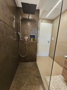 Kúpeľňa v ubytovaní Apartments Shema