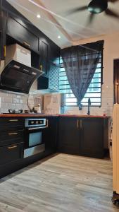Kuchyň nebo kuchyňský kout v ubytování DT2165 Homestay 4 Room 8 Guest
