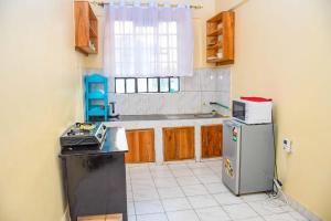 Kuchyň nebo kuchyňský kout v ubytování Jabali- Zuriel homes 1 bedroom apartment + 11 fotografií