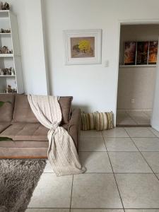 Posezení v ubytování Quarto no centro