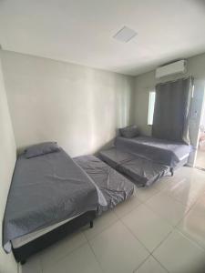 Katil atau katil-katil dalam bilik di Casa Paris