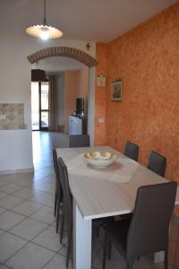 a kitchen and dining room with a table and chairs at Villa Marta in Città della Pieve