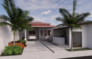 ein Haus mit Palmen und einem Auto, das darin geparkt ist in der Unterkunft COP 30- Casa Vila Real in Ananindeua