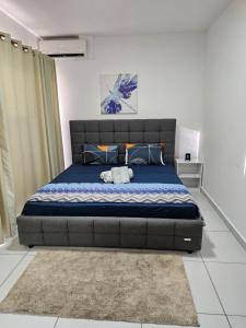 Postel nebo postele na pokoji v ubytování Villa Azure Flic-en-Flac 5 min de la plage