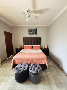 Ένα ή περισσότερα κρεβάτια σε δωμάτιο στο Hideaway Haven