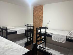 Postel nebo postele na pokoji v ubytování Calango Hostel