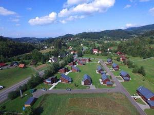 an aerial view of a small village with houses at Apartmán v Bečva Resortu in Horní Bečva