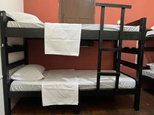 Postel nebo postele na pokoji v ubytování Calango Hostel