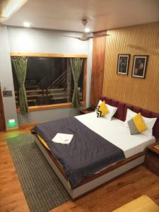 The Promise Hotel and Resort客房内的一张或多张床位