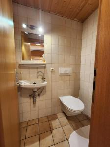 Koupelna v ubytování Haus Auracher