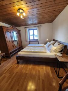 Postel nebo postele na pokoji v ubytování Haus Auracher