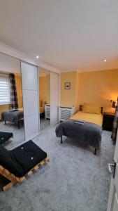 Ένα ή περισσότερα κρεβάτια σε δωμάτιο στο 3 Treig Road