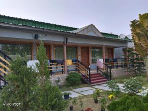 TajpurThe Promise Hotel and Resort的门廊和房屋之家度假屋