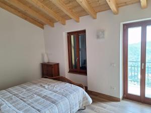 Postel nebo postele na pokoji v ubytování Hillside Haven - Sea View Retreat with Pool access + 21 fotografií